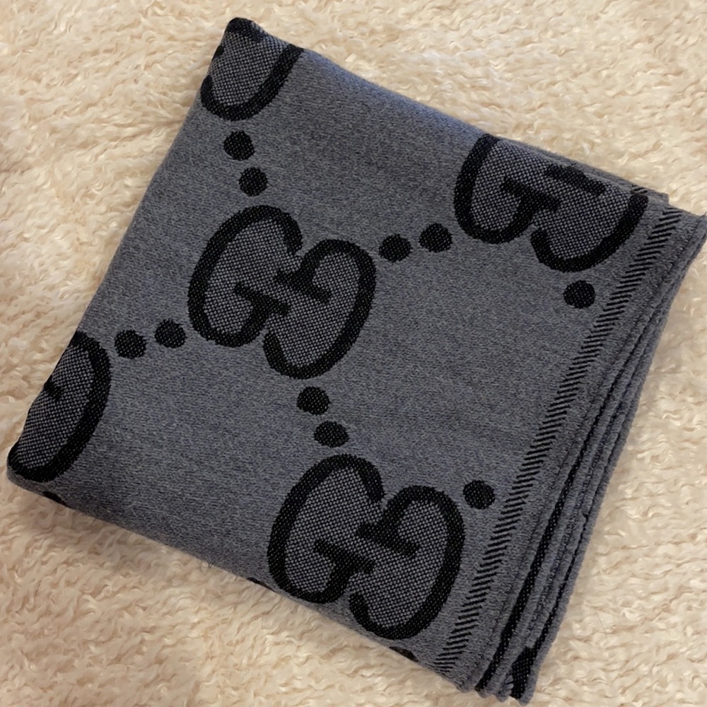 Large monogram Gucci Scarf.